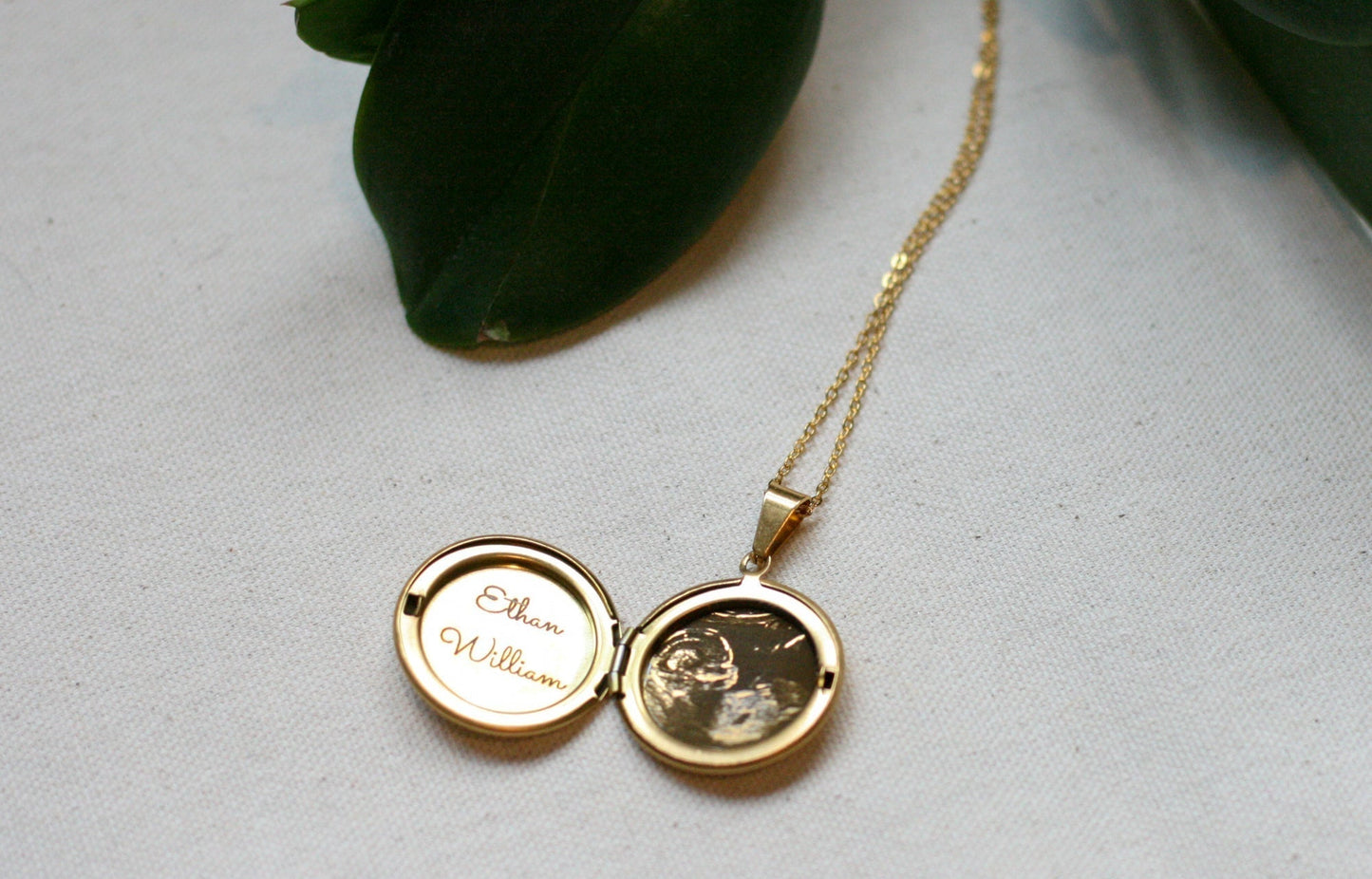 Engraved sonogram locket